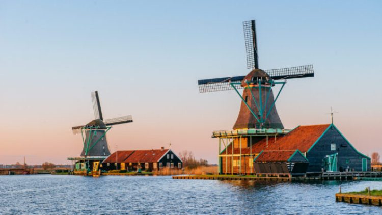 Traditional Dutch windmills from the channel Rotterdam. Holland